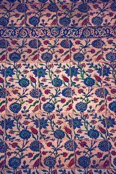 Cappadocia, Turkey, Europe: detail of ceramic tiles in the traditional Ottoman Iznik style, featuring floral motifs in shades of blue, red and turquoise with tulips, carnations and hyacinths
