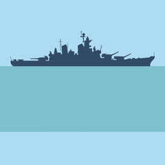 A dark silhouette of a large naval warship on calm water © Rizky