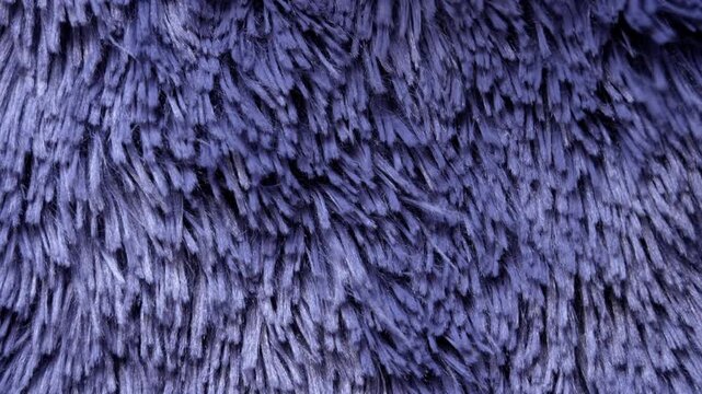 Fluffy blue faux fur texture close-up