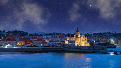 Fototapeta premium Cascais at night with stars. Palácio Seixas and Santa Marta waterfront.