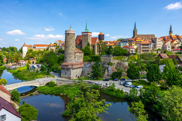 Fototapeta premium Scenic view of the historic town of Bautzen in Saxony, Germany. Medieval towers, colorful buildings, and historic architecture create a charming European cityscape. 