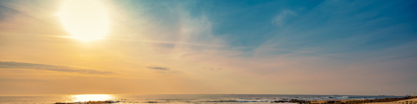 Seascape in the evening. Sunset over the sea with the beautiful blazing sky