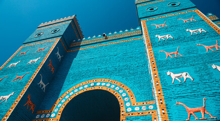 Explore the vibrant Ishtar Gate in Babylon, Iraq with its stunning blue and animal motifs © Dave