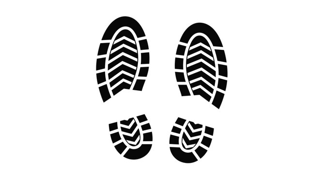 Pair of black boot footprints showing a heavy tread pattern left by soles isolated on a clean white background.