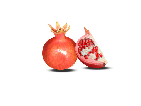 Pomegranate or Punica granatum fruit with slice isolated on a white background