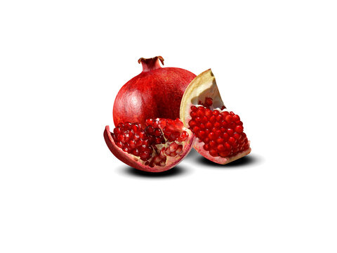 Pomegranate or Punica granatum fruit with slice isolated on a white background