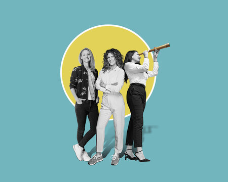  Confident young businesswomen's team smiling at the camera isolated white background.  Team ist Searching for information on the internet concept.