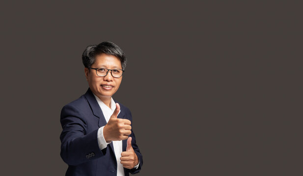 Businesswoman showing thumbs up for inclusive workplace