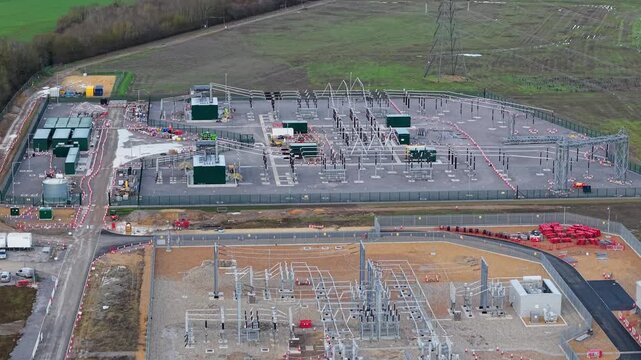 Aerial view of a major high-voltage electrical substation in Biggleswade, UK.