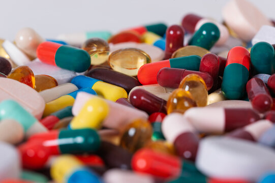 substance abuse and overmedication, Large pile of mixed prescription pills, capsules, and tablets