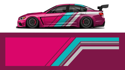 Vibrant pink and teal racecar with bold livery and dynamic stripes on a track. © Lailatul