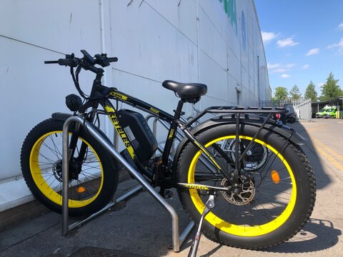 Keteles K800 yellow and black fat tire e-bike on a cycle stand in Boston Lincs.  UK. May 2026