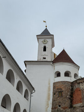 Clock tower and fortress walls of Palanok Castle in Mukachevo, Ukraine