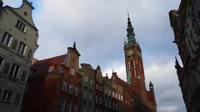 Static shot of the town hall clock tower with clouds passing over, Gdansk, Poland.
