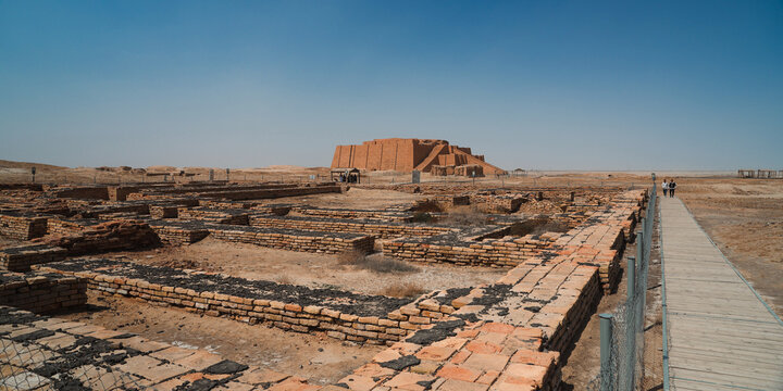 Exploration of the ancient Ziggurat of Ur in modern day Iraq during bright daylight
