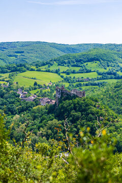Penne Castle on a rocky spur overlooking the village in the heart of the Gr&eacute;signe forest and the Gorges de l'Aveyron
