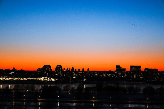 Jetliner Plane Takes off at Sun Set Golden Hour, DC with Blue Sky