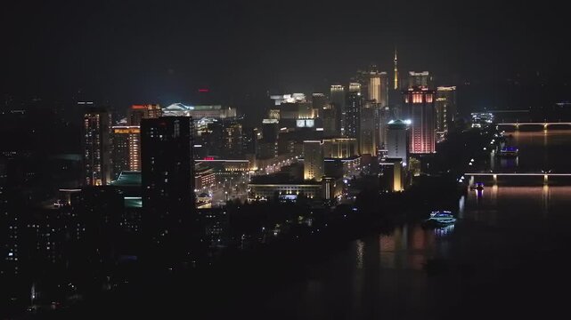 Panoramic view of Pyongyang from Yanggakdo Hotel. Taedong River in morning fog. Ryugyong Hotel and modern residential complex upstream. Atmospheric, calm, iconic. Pyongyang, North Korea