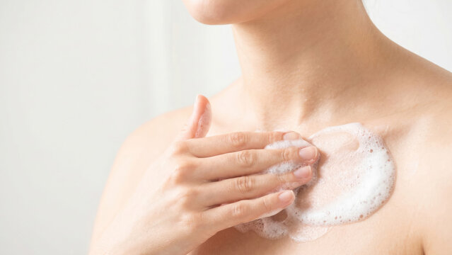 Gentle Foaming Cleanser Application on Collarbone and Lower Neck Area for Healthy Skin