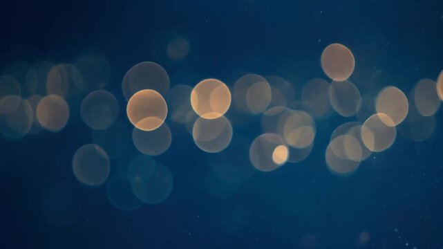 Floating circular bokeh clusters shifting smooth waves deep navy background faint cinematic ambience