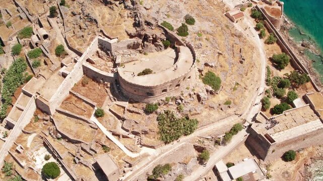 Aerial top down view of historic Spinalonga fortress ruins in Crete