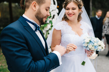 wedding ceremony of the newlyweds on the glade © omelnickiy