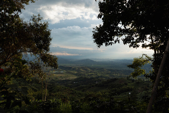 Cinematic landscape view of a green tropical valley in Sevilla Valle del Cauca, rural region of Colombia