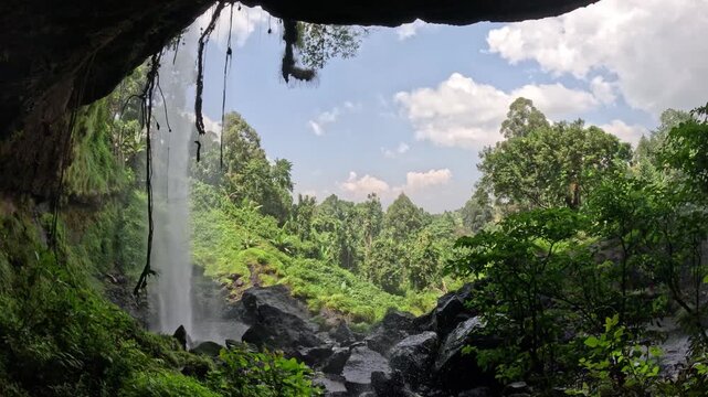 Relaxing nature footage of Sipi Falls Uganda with tropical landscape and peaceful waterfall scenery