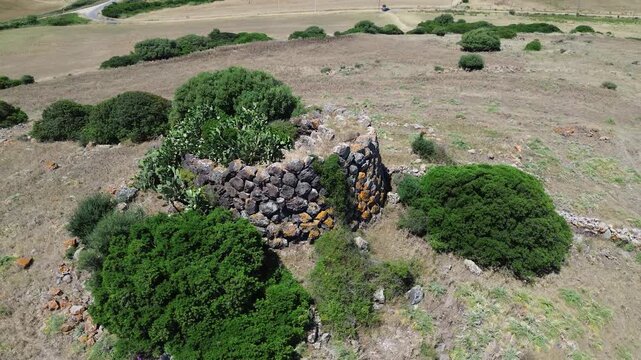Historic Nuraghe Paba de Soli ruin captured from above in rural Sardinia