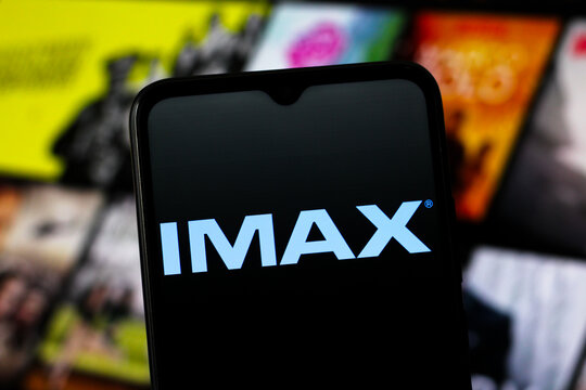 In this photo illustration, the IMAX Corporation logo is seen displayed on a smartphone screen.
