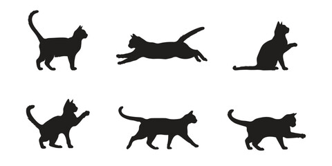 Black cat silhouettes in various poses on a white background playful feline shapes © GRAPHIC ZONE