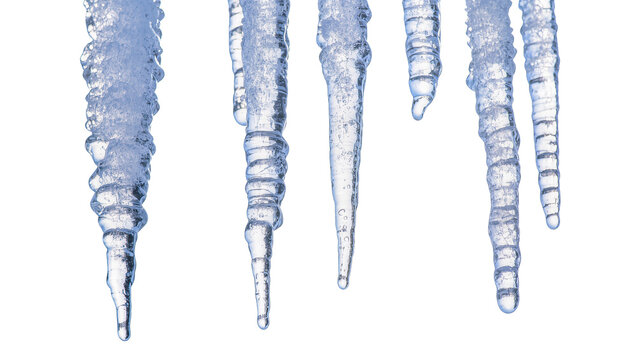 Isolated multiple clear blue icicles with water drops and bubbles, detailed close-up winter frost