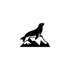 Seal Sitting on Rocks Icon. © Shena