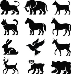 Fototapeta premium Black silhouettes of various animals including lion, elephant