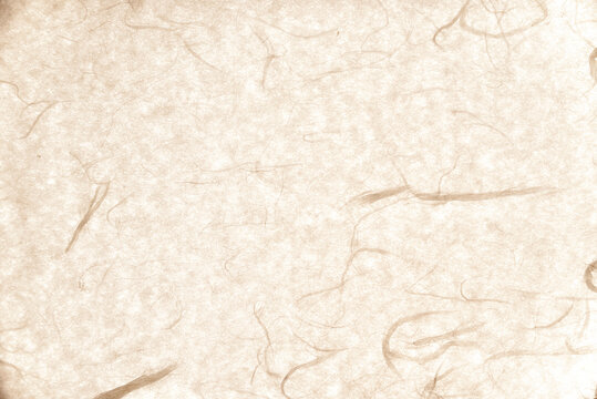 Warm beige traditional Korean paper (Hanji) texture background featuring natural mulberry plant fibers.