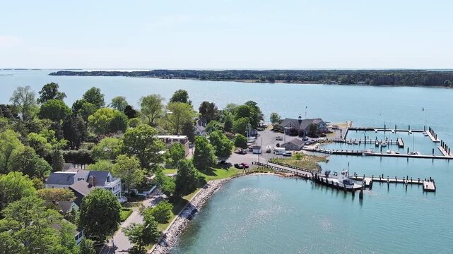 Aerial view of aOxford, MD peaceful waterfront community, beach, boat slips and ferry