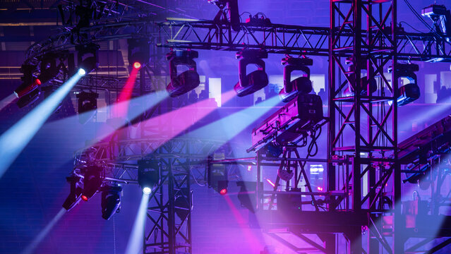 Stage lighting, Concert rigging system illuminates arena with colorful spotlights for live event production and entertainment show