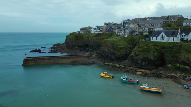 Aerial views of the picturesque costal village of Port Isaac on the north coast of Cornwall in the southwest of England.