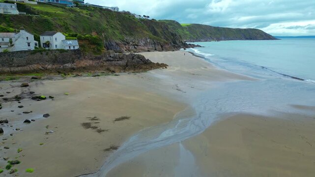 Aerial view of the beach and village of Gorran Haven on the south coast of Cornwall in the southwest of England.