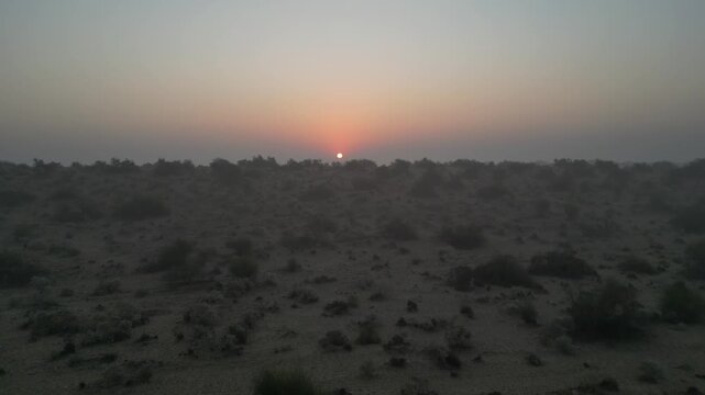 Sunrise drone shot in the Thar Desert, Jaisalmer, Rajasthan, India. 