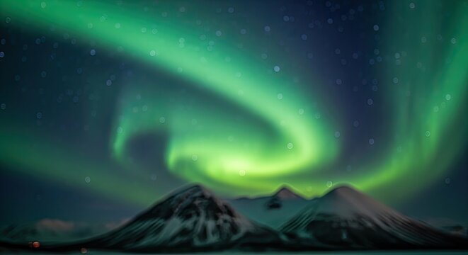 Vibrant Northern Lights Dance Over Snow-Capped Mountains at Night.