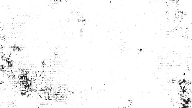 Black ink splatters and smudges on white paper texture with faint text fragments