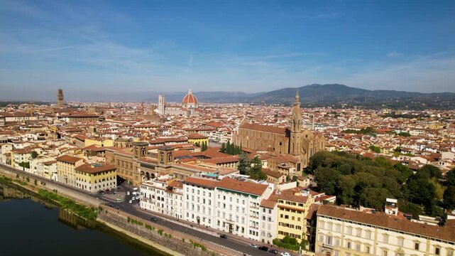 Florence Aerial Drone View from Arno River Reflection to Uffizi and Duomo Skyline Cathedral Historic Center Landmarks Panorama Tuscany Italy Cityscape Cinematic Flight Travel Destination UNESCO