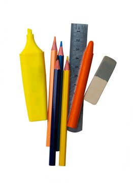 School supplies set with yellow highlighter colored pencils metal ruler orange crayon and eraser isolated transparent background. 