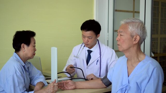 Asian senior couple check up with doctor at hospital longevity care medical trend 4k