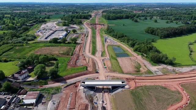 High angle aerial view of major High Speed Two railway line development and bulk earthworks in rural Warwickshire