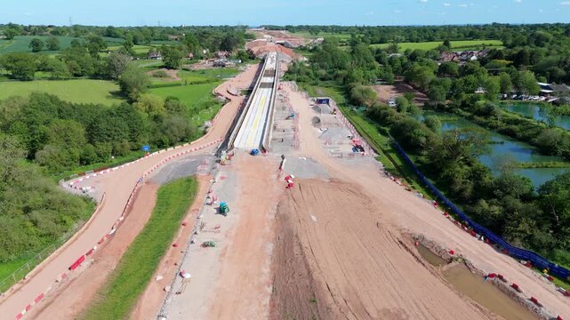 High angle aerial view of major High Speed Two railway line development and bulk earthworks in rural Warwickshire