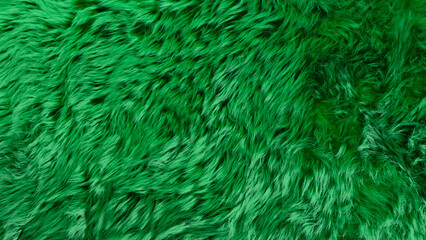 Vibrant Green Shaggy Fur Fabric Texture Background, Soft Fluffy Synthetic Faux Hair Carpet Surface Pattern, Bright Lime Fleece Material Backdrop, Long Pile Textile Design, Luxury Rug Close Up. © WONGSAKORN