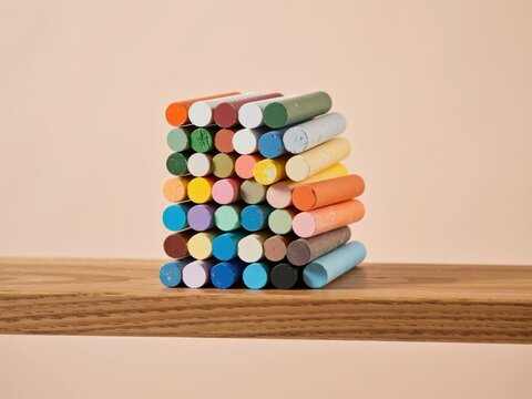 Colorful artistic pastels stacked creating educational art supplies