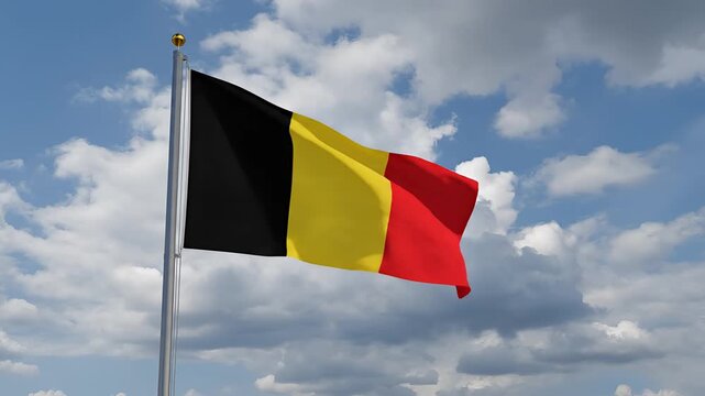 Belgian Flag Waving Proudly Against a Cloudy Sky.